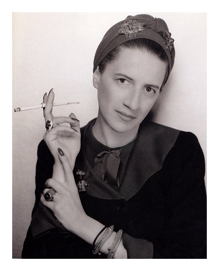 An Unusual Fashion Accessory - Cigarettes. Diana Vreeland holding a cigarette; Women & Smoking