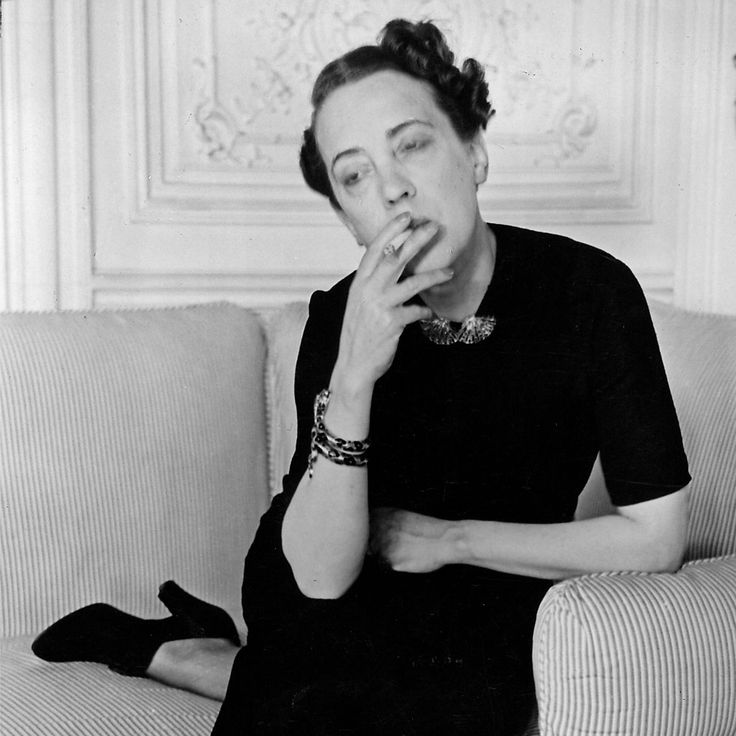 Elsa Schiparelli smoking a cigarette; Women & SMoking