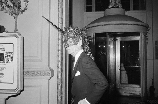Party of the Century; Iconic Decorator Billy Baldwin wearing perhaps the weirdest mask at the 1966 Black and White Party